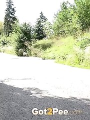 15 pictures - Cute babe rushes to beat her pee desperation