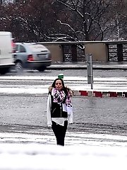15 pictures - Watch the snow melt as this dark haired babe pees