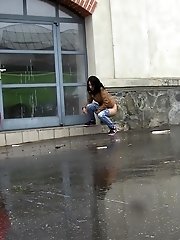 15 pictures - Gorgeous dark haired girl pees in public