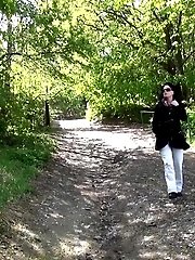 15 pictures - Dark haired girl in sunglasses pisses outside