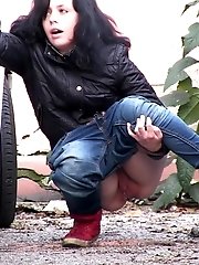 15 pictures - Hot dark haired girl pisses outside