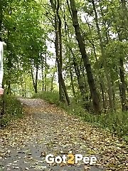 15 pictures - Pretty dark haired girl pisses while on a jog