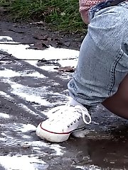 15 pictures - Cute blonde pisses onto snow to melt it