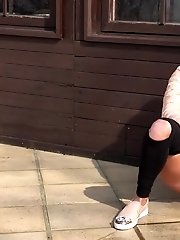 15 pictures - Dark haired babe squats to piss outside