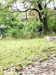 15 pictures - Exotic babe pisses twice in this outdoor scene